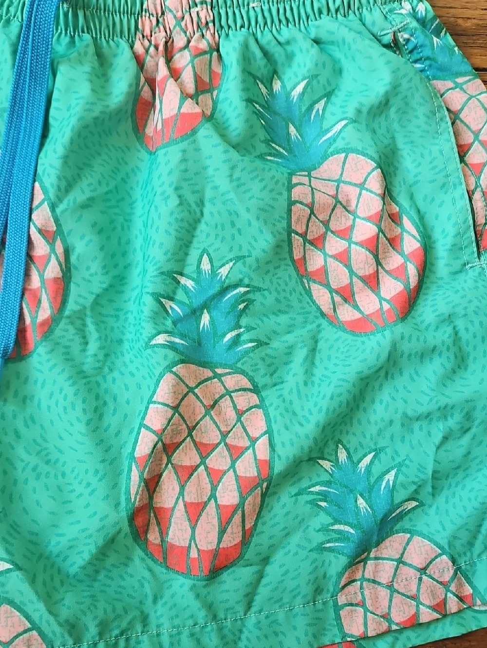 chubbies Turquoise Swim Shorts‎ with Coral Pineapples Medium